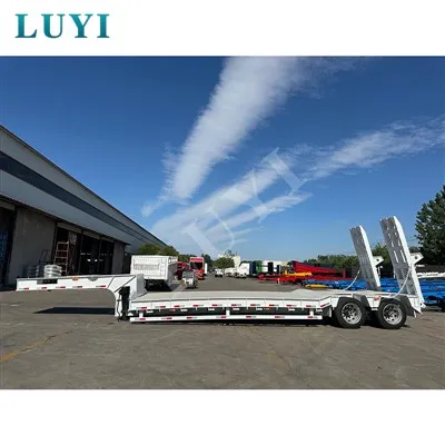 Дві авто вантажні вантажівки з низьким ліжком